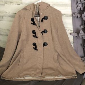 Sebby tan sweater jacket.